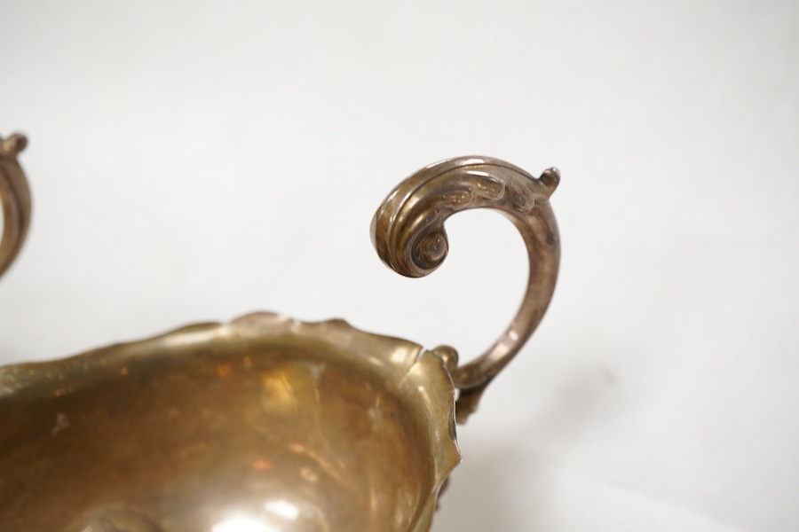 Sundry silver, consisting of - a pair of George V sauce boats, S. Blanckensee & Sons Ltd, Birmingham, 1936, a George III marrow scoop, Peter & Ann Bateman, London, 1793, a Victorian Scottish Kings pattern sauce ladle, te